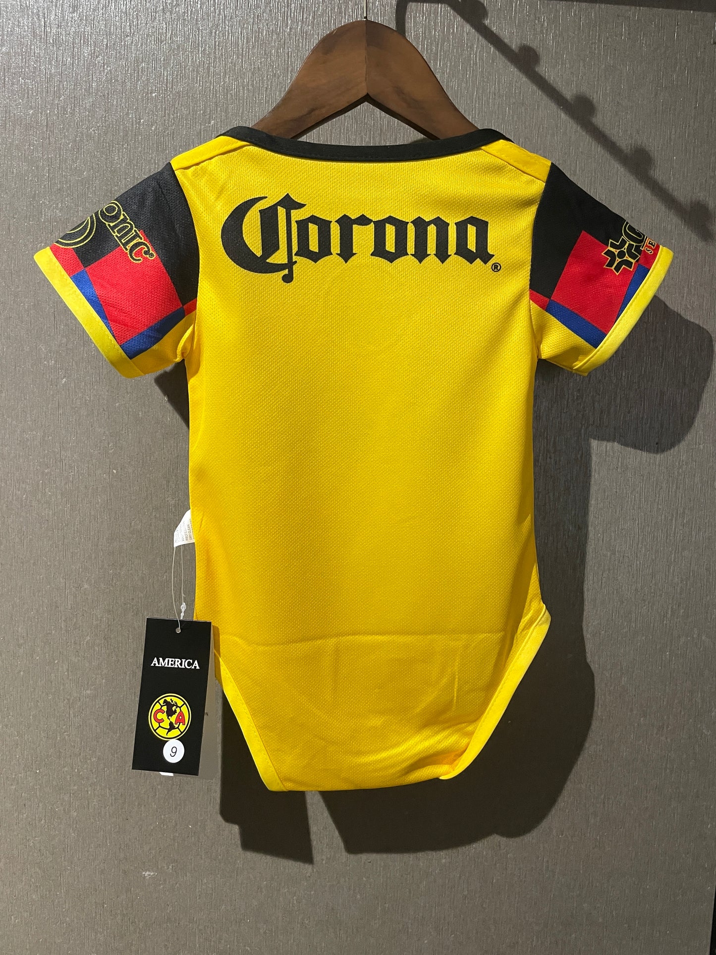 Body Bebê Infantil America do Mexico Home 25/26 . - Amarelo