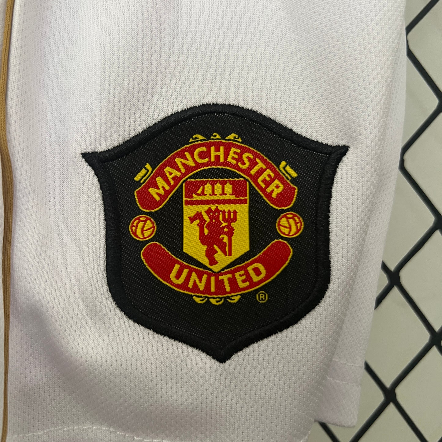 Kit infantil Manchester United RetrƓ Home 2006 . - Vermelho