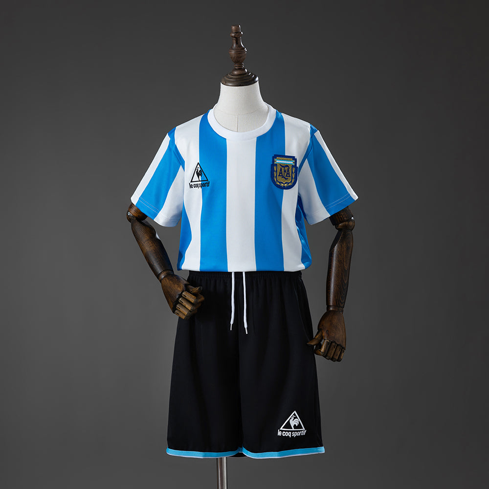 Kit Infantil Argentina Retro Home 1986 Le Coq Sportif -Branco e Azul