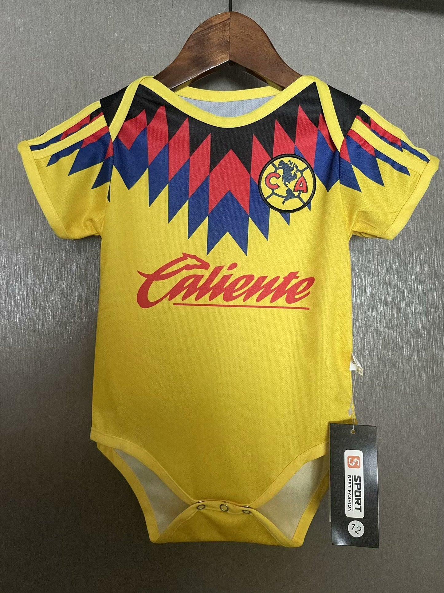 Body Bebê Infantil America do Mexico Home 25/26 .  - Amarelo