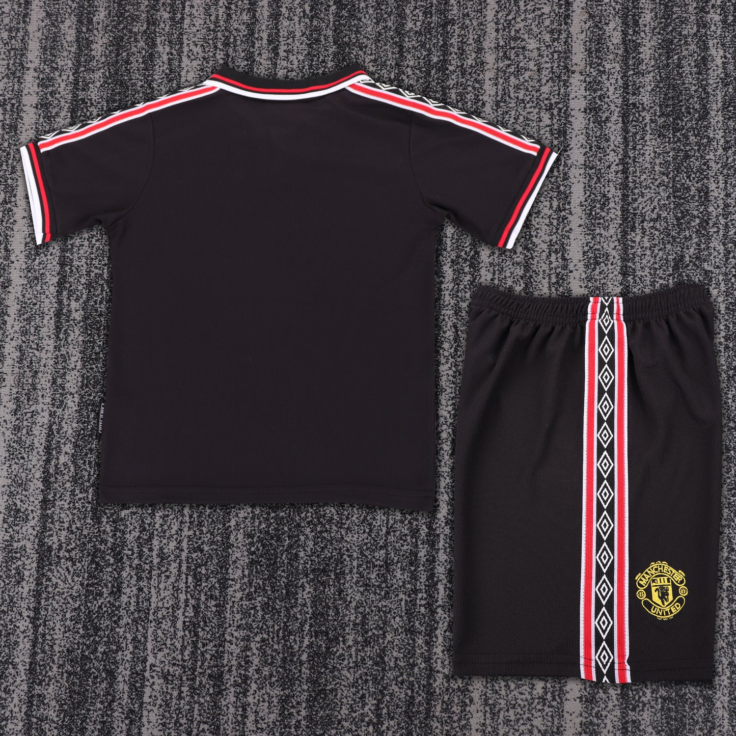 Kit infantil Manchester United Retrô Away 98/99 . - Preto