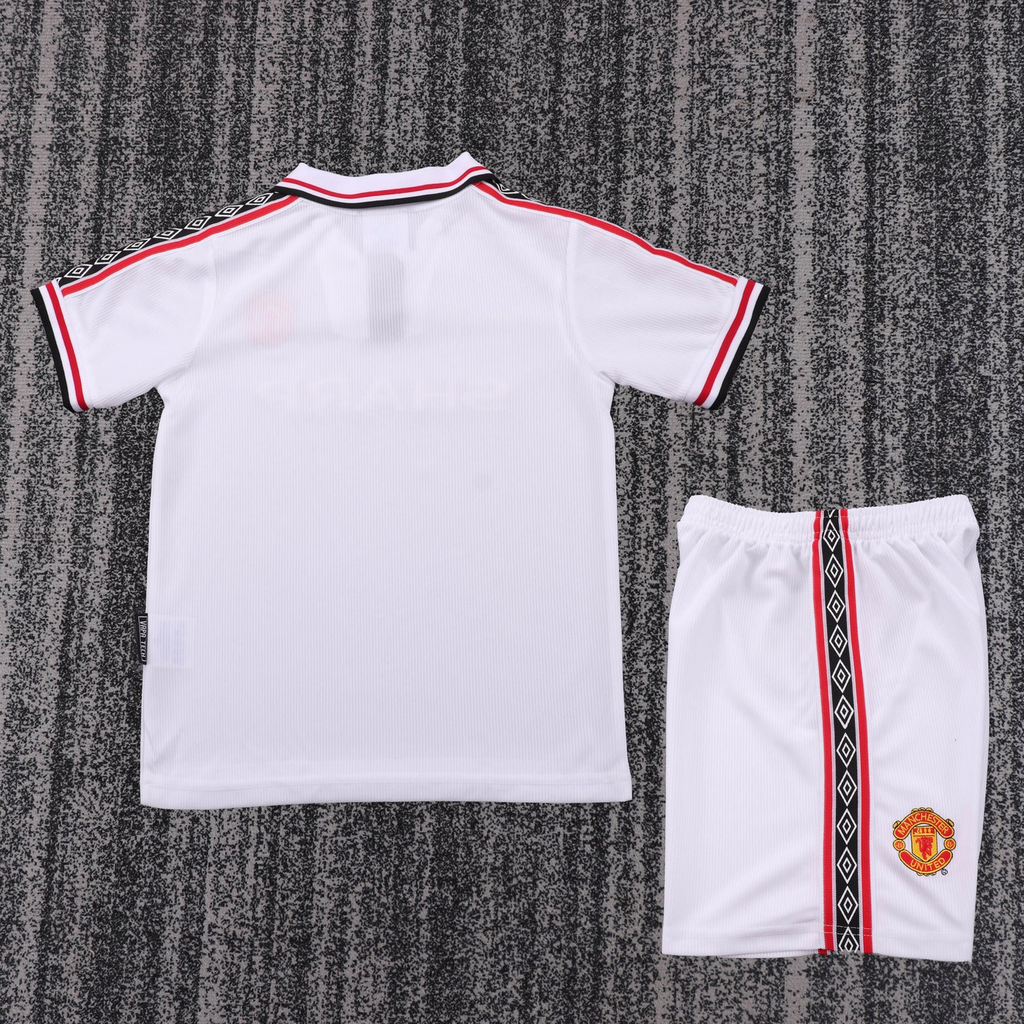 Kit infantil Manchester United Retrô Away 98/99 . - Branco