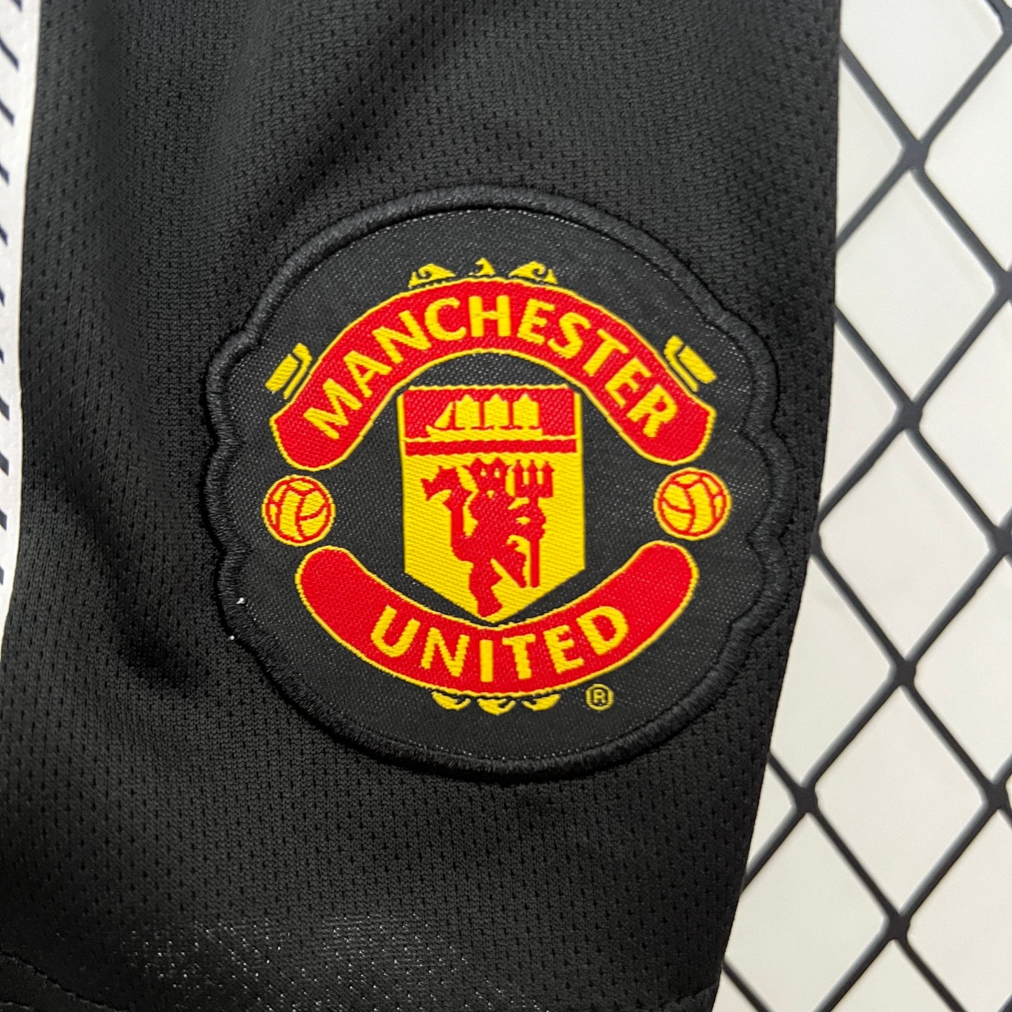 Kit infantil Manchester United Retrô Away 2010 . - Branca