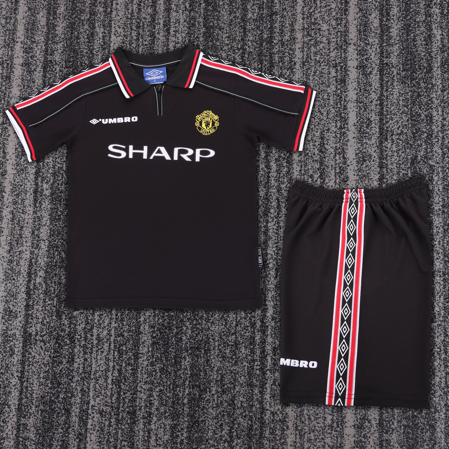 Kit infantil Manchester United Retrô Away 98/99 . - Preto