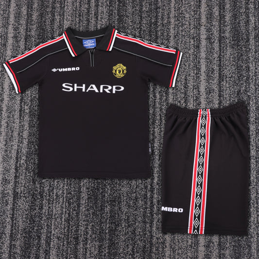 Kit infantil Manchester United Retrô Away 98/99 . - Preto