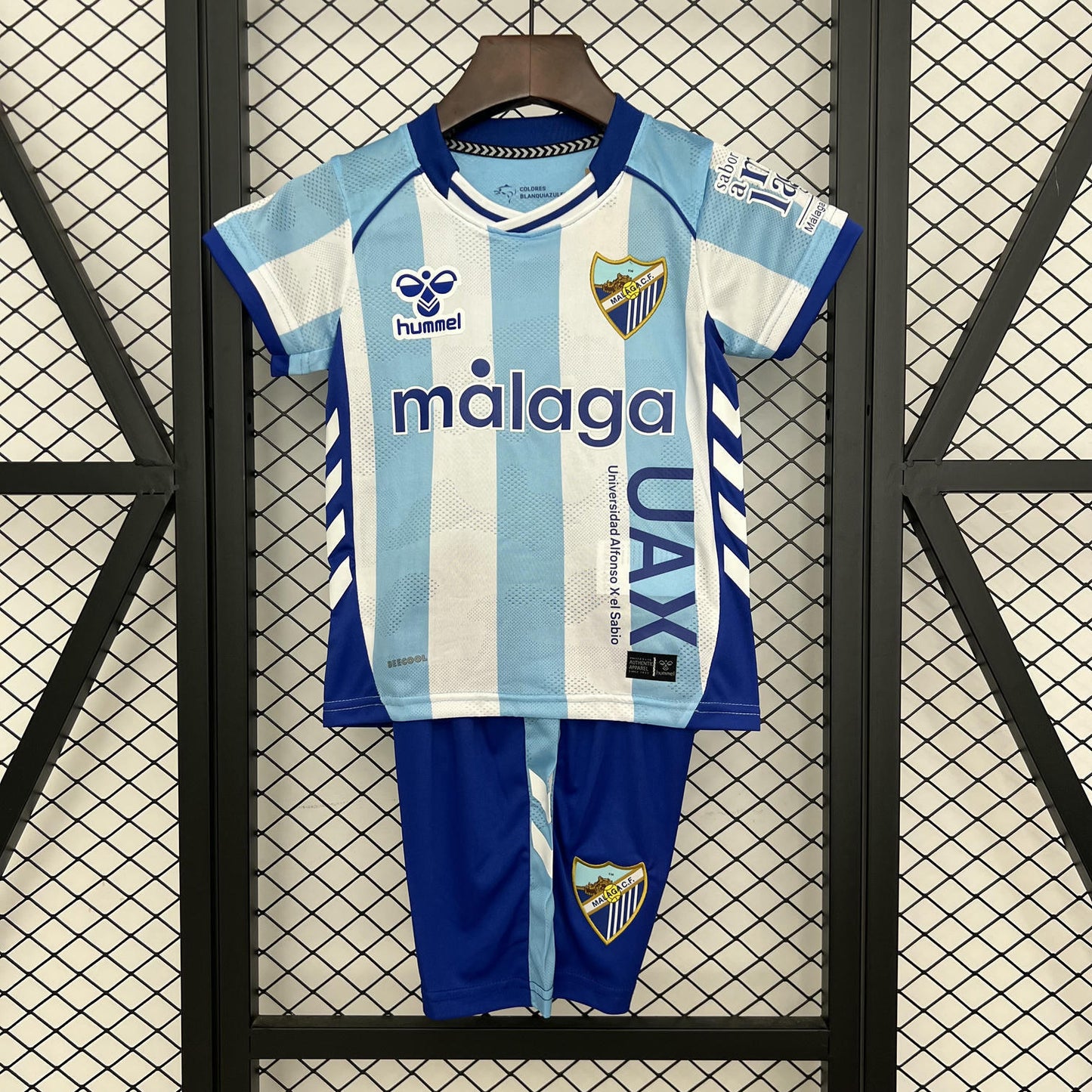 Kit Infantil Malaga Home 25/26 . Hummel -  Azul e Branco