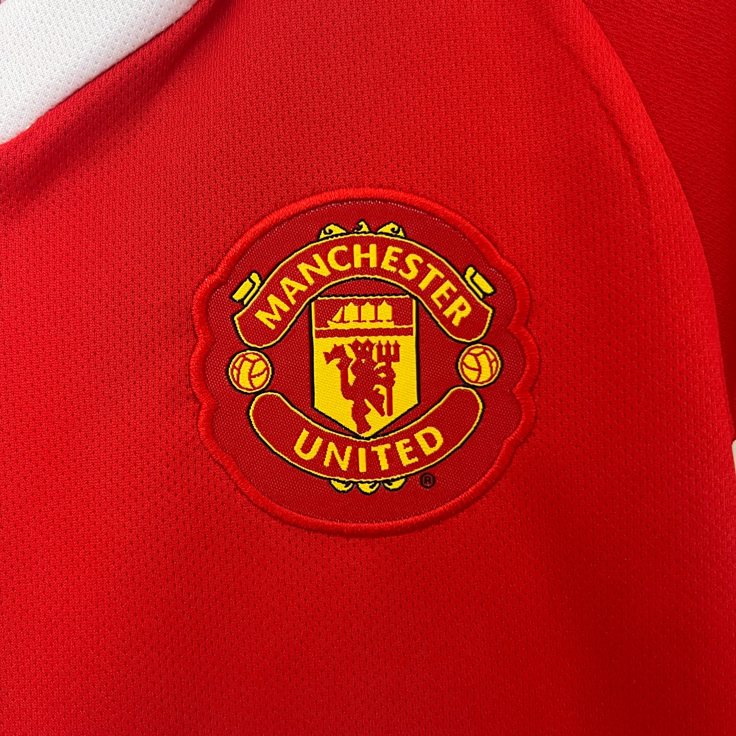 Kit infantil Manchester United Retrô Home 2010 . - Vermelho
